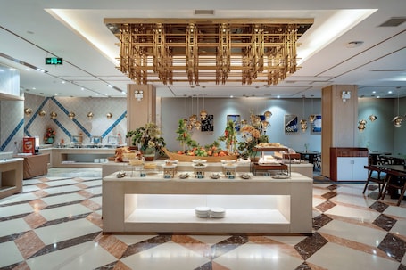 Restaurant. Grand Madison Hotel Linfen