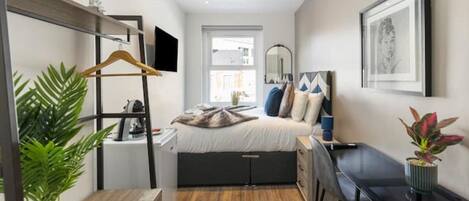 1 chambre, fer et planche à repasser, Wi-Fi, draps fournis