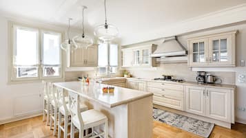 Exclusive Apartment | Private kitchen | Full-size fridge, microwave, oven, stovetop