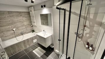 Hair dryer, towels, soap, shampoo