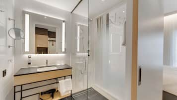 Shower, rainfall showerhead, hair dryer, towels