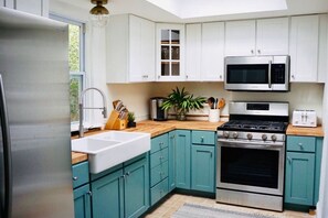 Microwave, coffee/tea maker, cookware/dishes/utensils