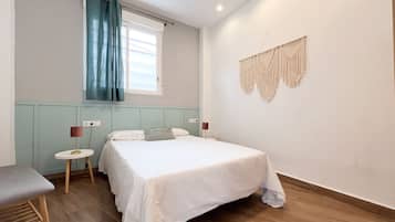 2 dormitorios, tabla de planchar con plancha, wifi