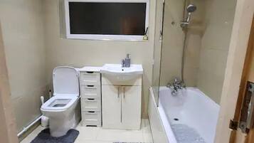 House | Bathroom | Combined shower/tub, deep soaking tub, towels