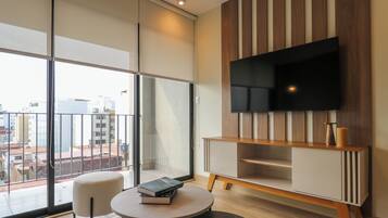 Apartamento, 2 habitaciones (610) | Zona de estar | Una Smart TV