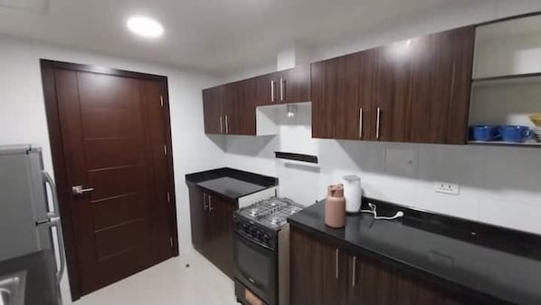 Private kitchen - Skyline Suites-aventura de Lujo (La Paz)