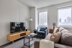 TV, stereo - Deluxe Midtown 1BR w/ Elev, W/D, nr Times Sq & Bryant Park, by Blueground (Midtown)