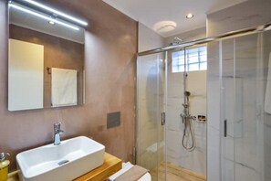 Hair dryer, towels, soap, toilet paper