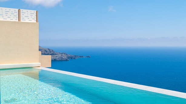 A clear blue sky, a swimming pool, and a distant view of the sea. - Pyrgos Exquisite villa 5 ,private pool,South Crete (Plakias)