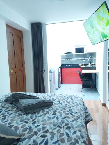 Fully equipped studio with kitchen; ideal for long stays.