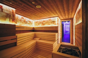 Sauna, hot tub, steam room, hot stone massages, deep-tissue massages