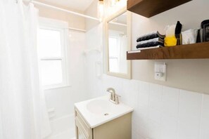Hair dryer, towels, soap, shampoo
