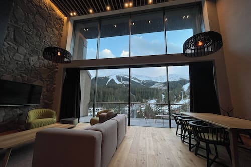 Swiss, Executive Apartment, 3 Bedrooms | Living area | 55-inch Smart TV with digital channels
