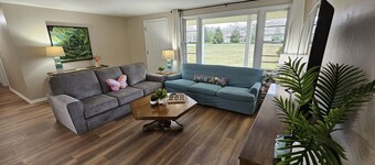 Relax and unwind in this colorful home close to hospitals and colleges!