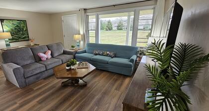 Relax and unwind in this colorful home close to hospitals and colleges!