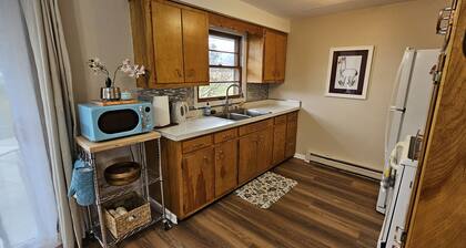 Relax and unwind in this colorful home close to hospitals and colleges!