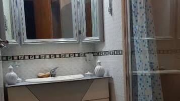 Bidet, towels, soap, shampoo