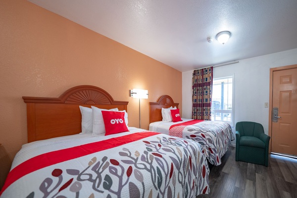 Premium Room, Multiple Beds, Kitchenette | Desk, WiFi (free), bed sheets