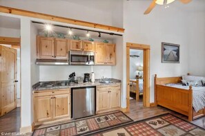 Fridge, microwave, stovetop, coffee/tea maker