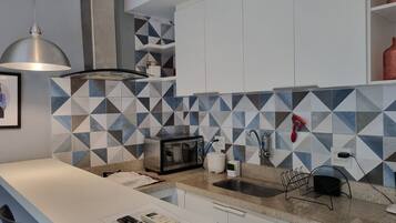 Apartamento básico | Cozinha privada | Frigobar, micro-ondas, liquidificador