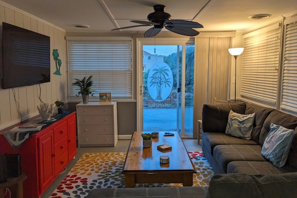 SUNROOM WITH PATIO SLIDER TO PATIO/LAKE