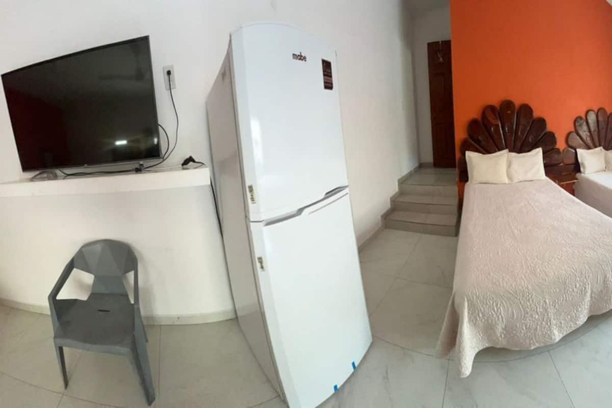 Standard Triple Room, Multiple Beds, 2 Bathrooms, Pool View | Premium bedding, pillowtop beds, individually decorated