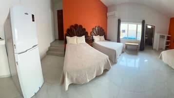 Standard Triple Room, Multiple Beds, Shared Bathroom, Courtyard View | Premium bedding, pillowtop beds, WiFi (free), individually decorated
