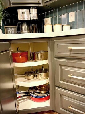 A kitchen with a coffee maker, a kettle, and a sign that says 'Coffee is a hug.' - Remodeled 4BR near Maidu Park · Roseville/Granite Bay · Pets OK (Roseville)