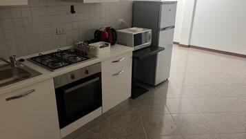 Frigorifero nell'area comune, forno a microonde nell'area comune