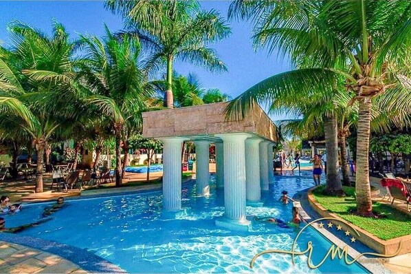 15 outdoor pools, pool umbrellas, pool loungers