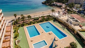 A resort with two swimming pools, a beach, and a view of the sea. - Voramar by Interhome (Calpe/Calp)