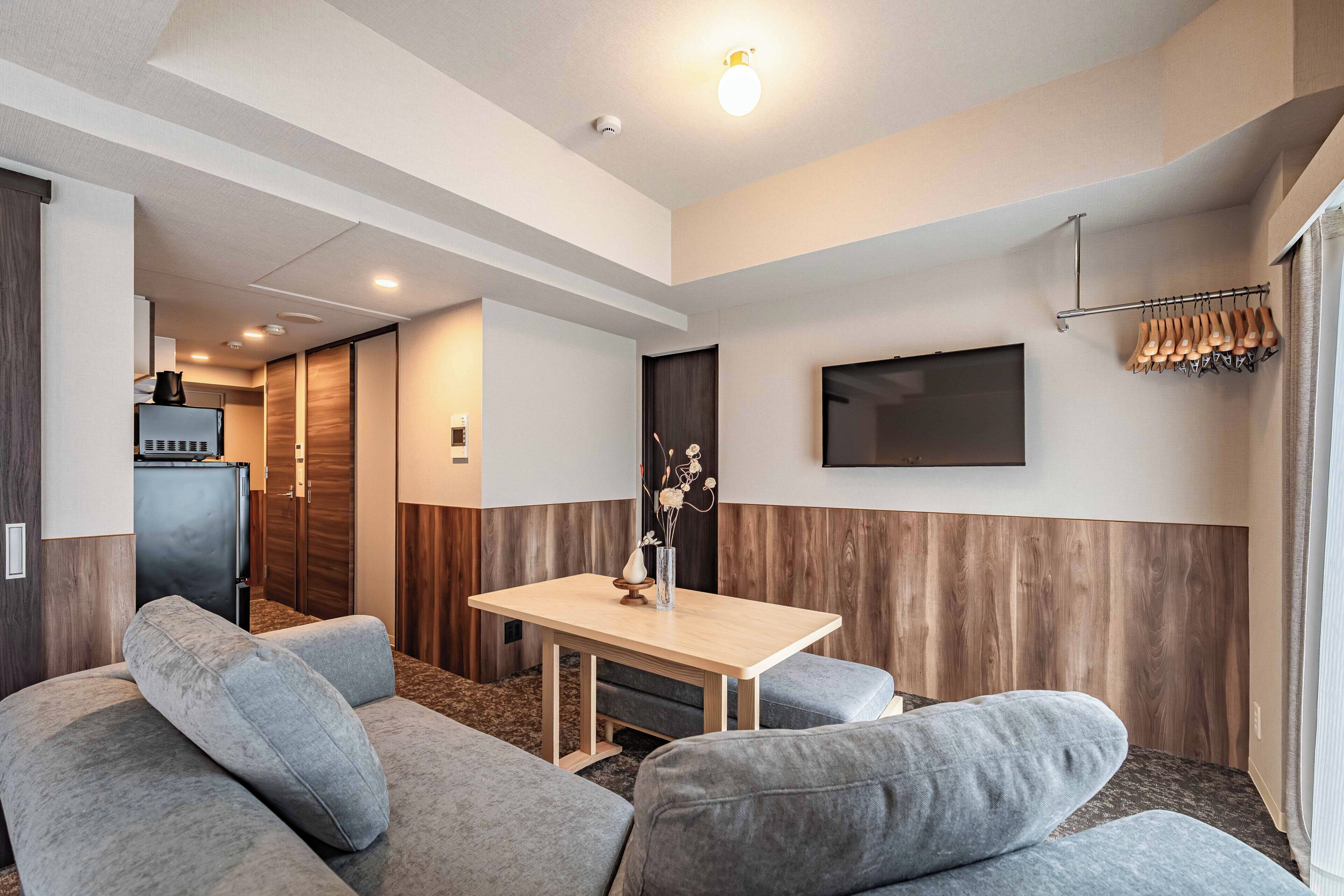 Family Suite, Multiple Beds, City View | Living area | 40-inch flat-screen TV with digital channels, TV