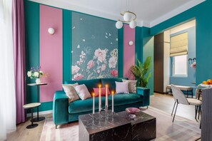 Design Apartment | Living area | 42-inch Smart TV with cable channels, Netflix, streaming services - Flowers in Wonderland by HOLT (Bucharest)