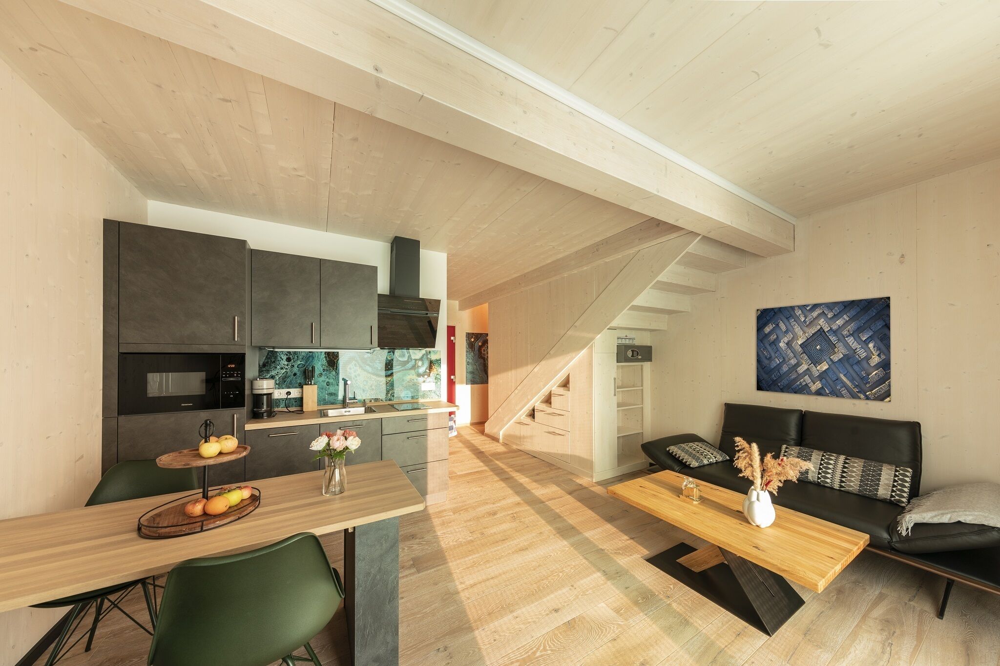 Ferienhaus Schneeberg-Wohn- und Esszimmer mit Zugang zur Terrasse