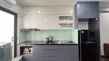 City Apartment, 2 Bedrooms | Private kitchen | Fridge, stovetop, rice cooker, cookware/dishes/utensils