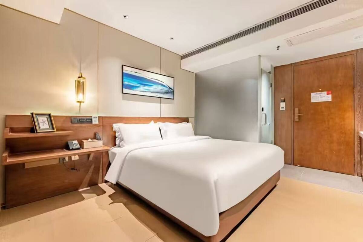 Premium bedding, blackout drapes, soundproofing, iron/ironing board