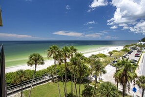 On the beach, beach towels, motor boating - Island Living! Beachfront Condo. Local Art. Heated Pool, Tennis, Spacious, Private & Secure. (Treasure Island)