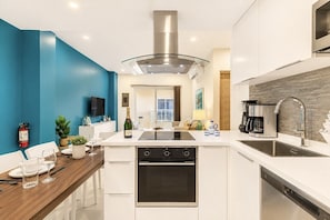 Coffee/tea maker, fridge, microwave, oven