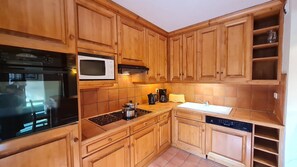 Refrigerador, microondas, horno y lavavajillas 