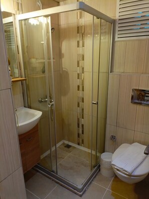 Standard Room, Balcony, Sea View | Bathroom | Shower, hair dryer, slippers, towels