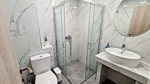 Hair dryer, towels, soap, toilet paper