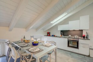 Family Apartment, Multiple Bedrooms (Loft & Jacuzzi) | Private kitchen | Fridge, microwave, oven, stovetop - Loft & Jacuzzi (Riva del Garda)