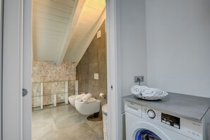 Family Apartment, Multiple Bedrooms (Loft & Jacuzzi) | Bathroom | Shower, hair dryer, bidet, towels - Loft & Jacuzzi (Riva del Garda)