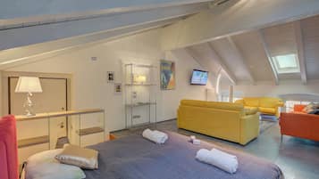 Family Apartment, Multiple Bedrooms (Loft & Jacuzzi) | 2 bedrooms, iron/ironing board, free WiFi, bed sheets