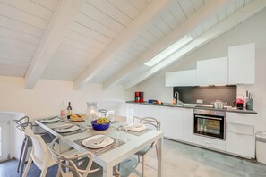 Family Apartment, Multiple Bedrooms (Loft & Jacuzzi) | Private kitchen | Fridge, microwave, oven, stovetop - Loft & Jacuzzi (Riva del Garda)