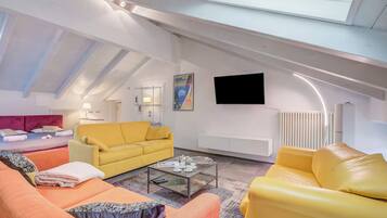 Family Apartment, Multiple Bedrooms (Loft & Jacuzzi) | 2 bedrooms, iron/ironing board, free WiFi, bed sheets