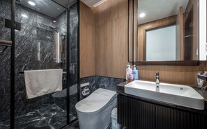 Deluxe Apartment, 3 Bedrooms, Balcony, City View | Bathroom | Shower, hydromassage showerhead, hair dryer, slippers - The LUMIÈRE Riverside -ANGIA Hospitality (Ho Chi Minh City)