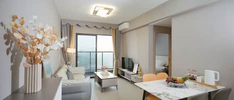 43-inch Smart TV with cable channels, first-run movies