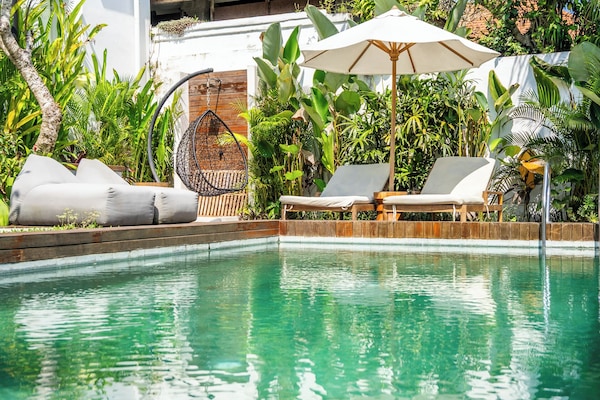 Outdoor pool, pool umbrellas, pool loungers