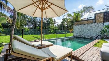 Outdoor pool, pool umbrellas, pool loungers